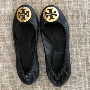 Black Tory Burch flats.